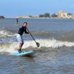 Ciclone Cari provoca “pororoca” em Imbé e garante surfe no rio