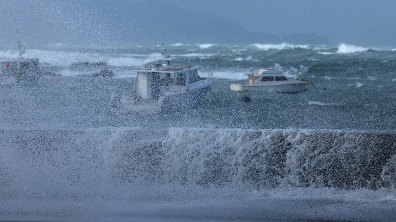 Stormy seas pound the coastline in the Wellington suburb of Island Bay on June 9, 2026.Hundreds of people were forced to evacuate their seaside homes on June 9 in New Zealand's capital as 11-metre high waves lashed the city's south coast.
